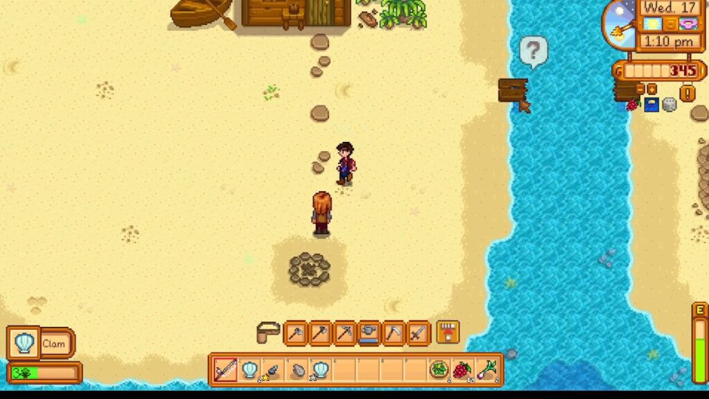 Top-down beach scene: two characters stand on sand near a small circular stone pit, with a wooden shack up ahead and a blue river on the right.